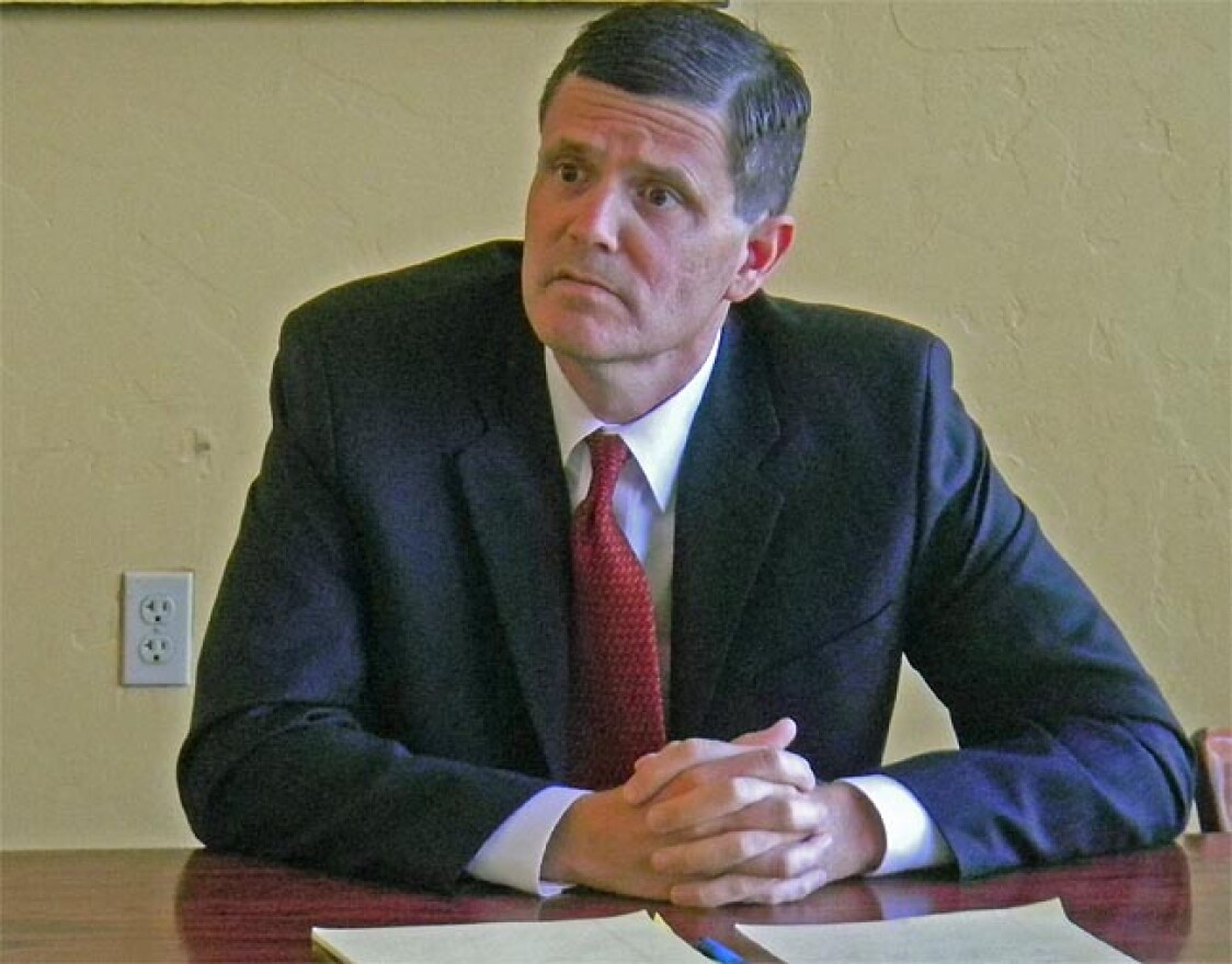State Rep. Troy Kelley, a Democrat running for State Auditor, answers reporter questions in August about his private business dealings. Photo by Austin Jenkins